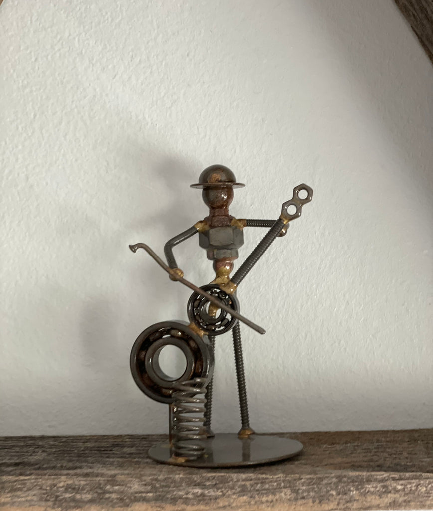 Recycled Cello Player